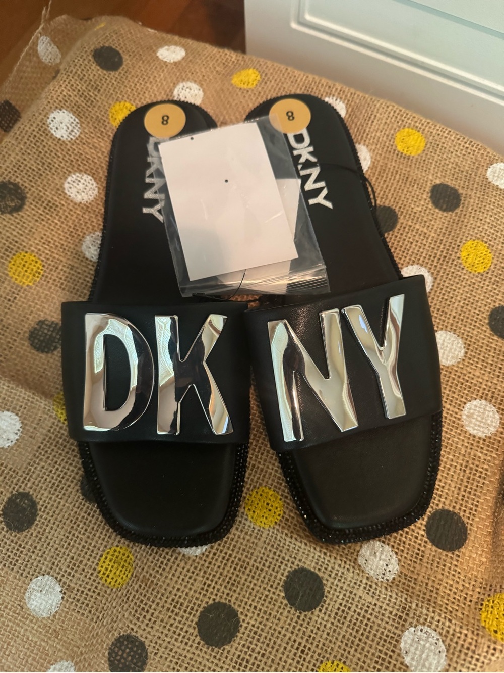 DKNY Black Slide Sandals with Silver Logo Plate - Picture 2 of 5